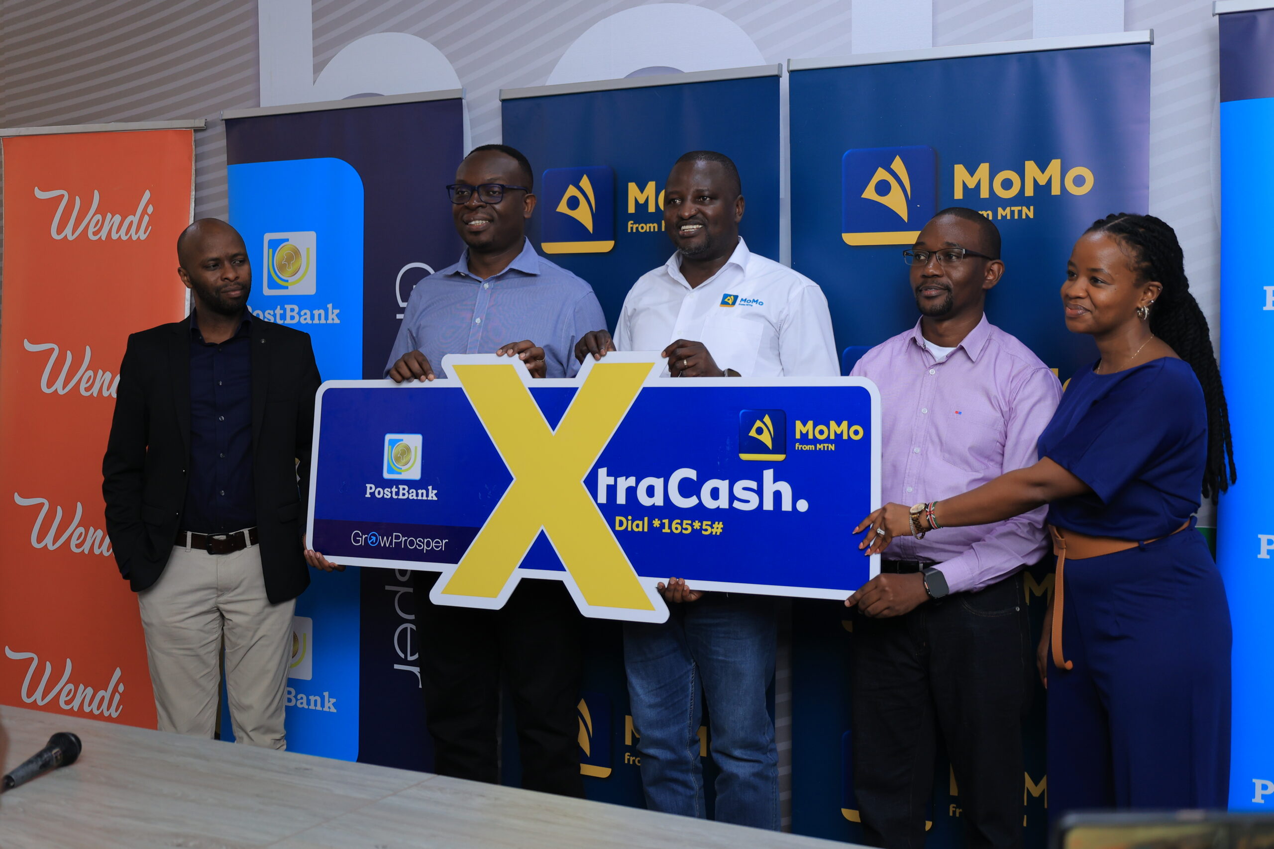 MTNMoMo partners PostBank Uganda to introduce ‘XtraCash’ to provide loans for subscribers